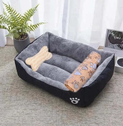 Bone-shaped soft cotton dog bed, washable and breathable with warm padding, designed for year-round comfort and suitable for dogs of all sizes.