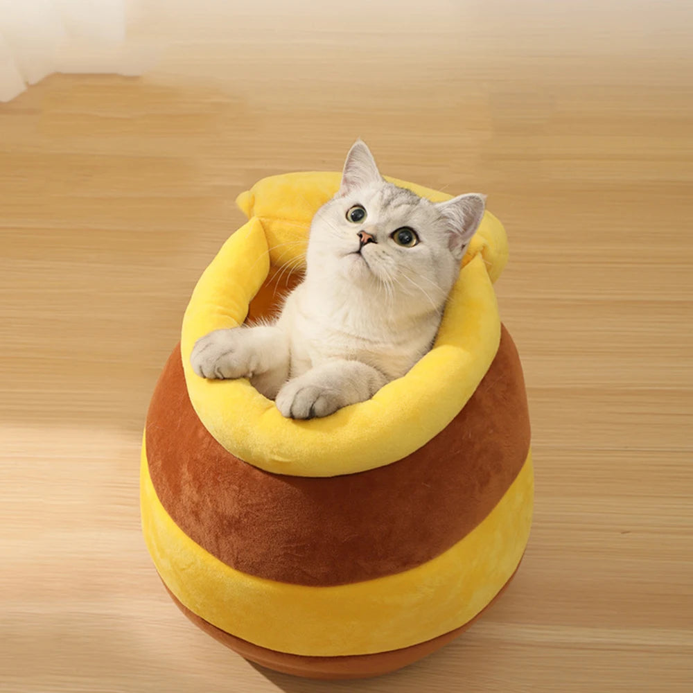 Soft plush cat bed in honey pot design with removable cushion for small cats