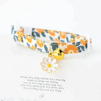 Reflective plaid cat collar with bow and daisy charm for small pets