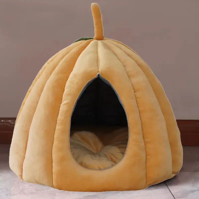 Pumpkin-shaped cat bed, Halloween pet bed for cats, fully enclosed pet nest, cozy winter cat nest, festive cat cushion.