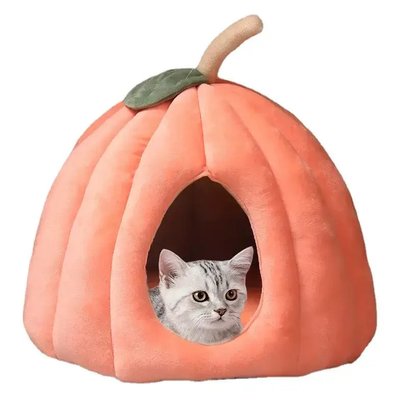 Pumpkin-shaped cat bed, Halloween pet bed for cats, fully enclosed pet nest, cozy winter cat nest, festive cat cushion.