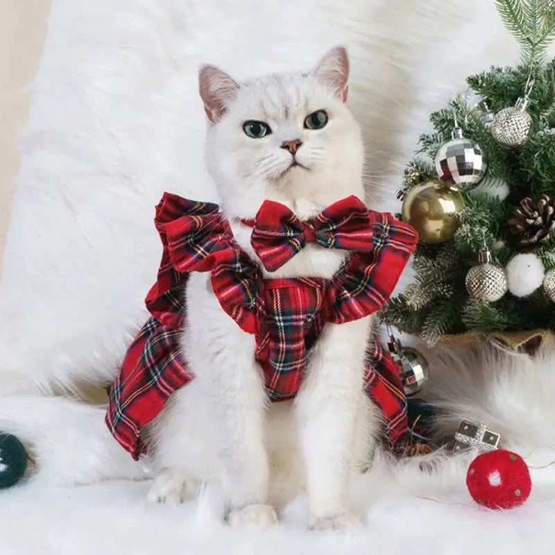 Cat wearing a flannel Christmas hoodie featuring Santa Claus and elk designs, perfect for holiday celebrations.