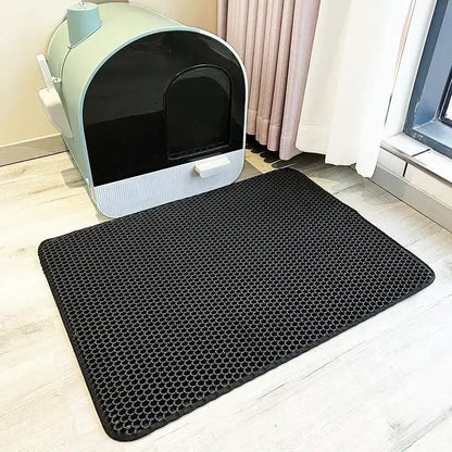 Double-layer waterproof cat litter mat made of soft EVA material for easy litter collection and floor protection.