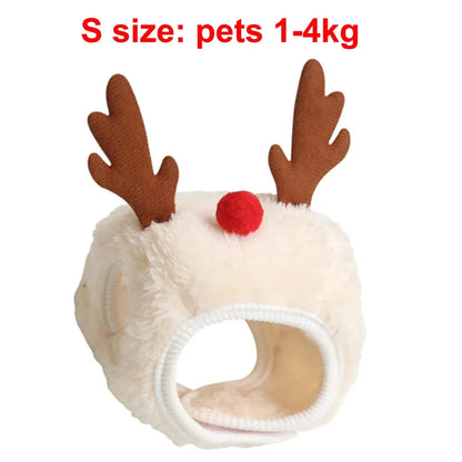 Pet wearing a Santa elk hat and Christmas bandana bib scarf for holiday celebration
