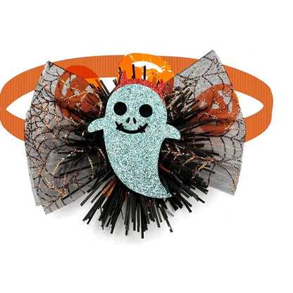 Dog wearing a cute pumpkin and skull Halloween bow tie for festive fun.