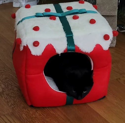 A black cat lie in a bed which like a Christmas gift box - Customer review photo