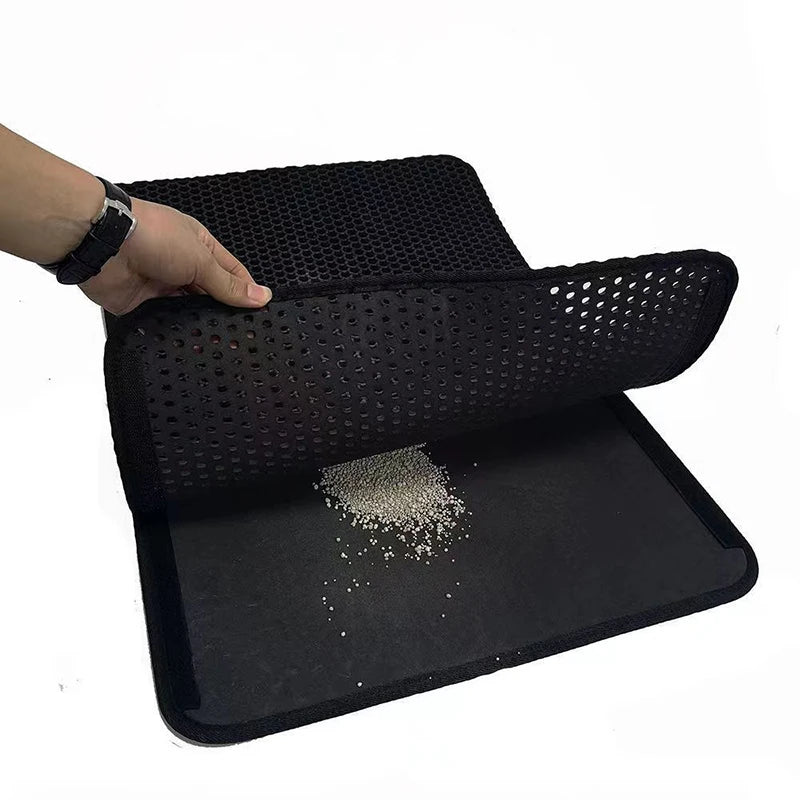 Double layer EVA cat litter mat with waterproof bottom, non-slip surface, and hexagonal holes for litter capture, ideal for maintaining a clean pet area.