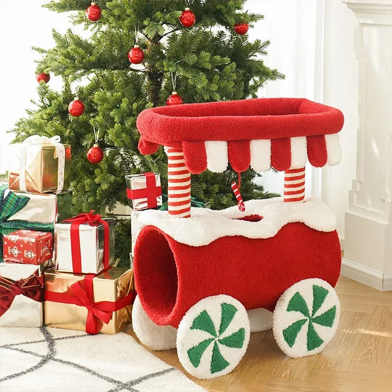 Christmas-themed cat climbing frame with cozy sleeping nest and sisal scratching posts.