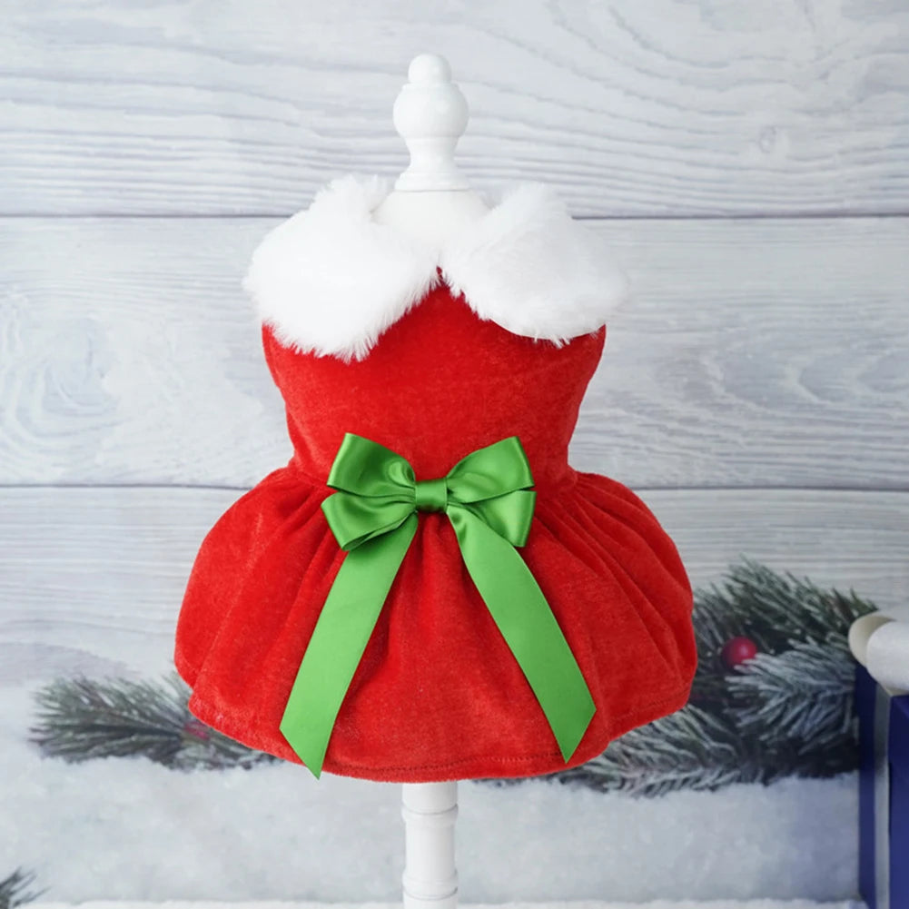 Festive Christmas dress for small dogs and cats, featuring a red skirt and glittering belt for holiday celebrations.