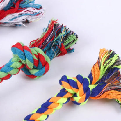 Durable cotton rope dog toy with knot design for small dogs and puppies, promotes dental health and safe chewing.