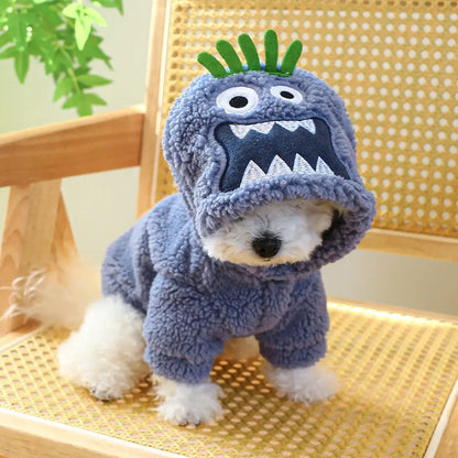 Small dog wearing a thick plush Halloween hoodie coat for chilly weather.