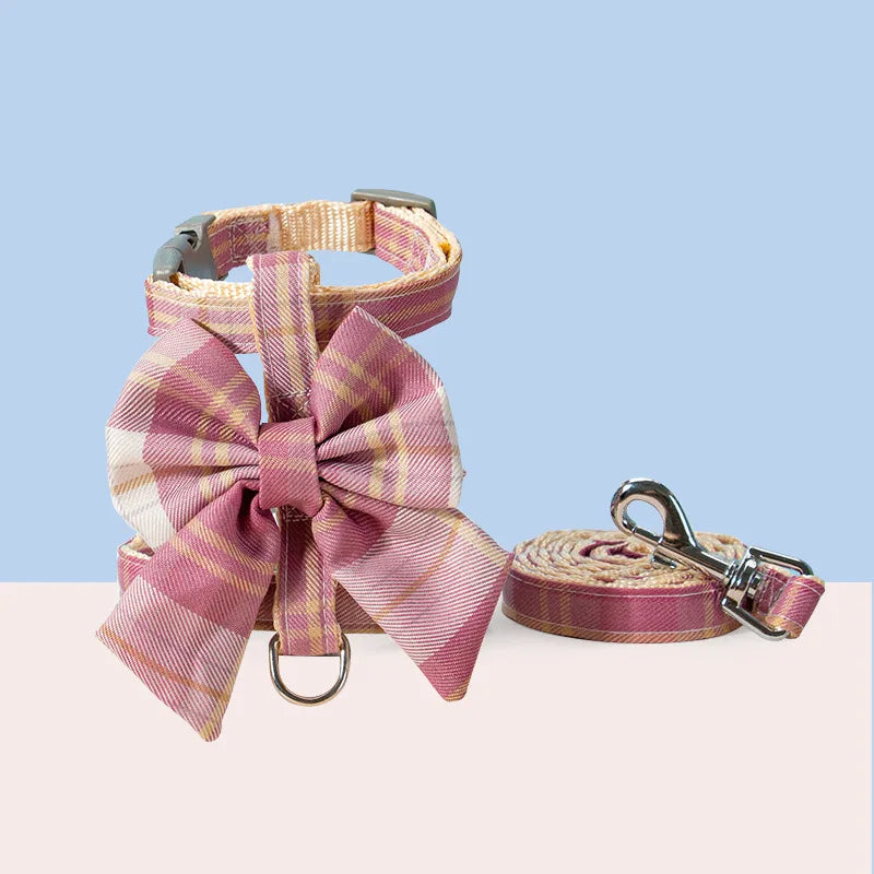 Adorable cat and dog harness vest with adjustable breast strap and matching leash for small pets.