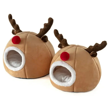 Indoor cat cave bed with Christmas reindeer design for holiday comfort and warmth.