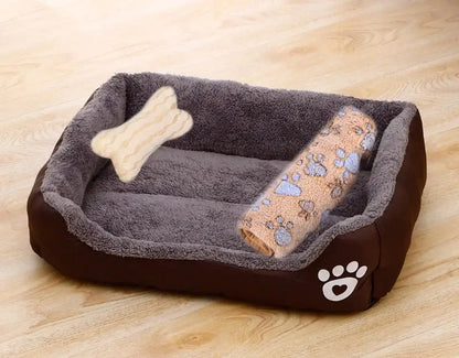 Bone-shaped soft cotton dog bed, washable and breathable with warm padding, designed for year-round comfort and suitable for dogs of all sizes.