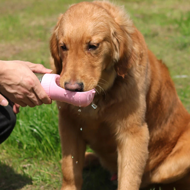 Portable 2 in 1 dog water bottle with food dispenser, perfect for outdoor walks and adventures, ensuring hydration and nutrition for your pet.