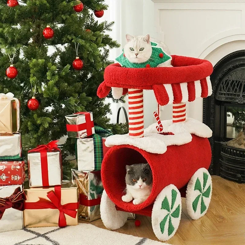 Christmas-themed cat climbing frame with cozy sleeping nest and sisal scratching posts.