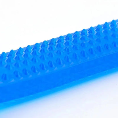 Durable rubber bone dog chew toy with toothbrush-style ridges for dental cleaning and plaque removal, ideal for aggressive chewers of all sizes.