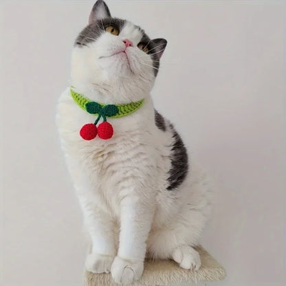 Handmade knitted pet collar with cherry decoration for cats