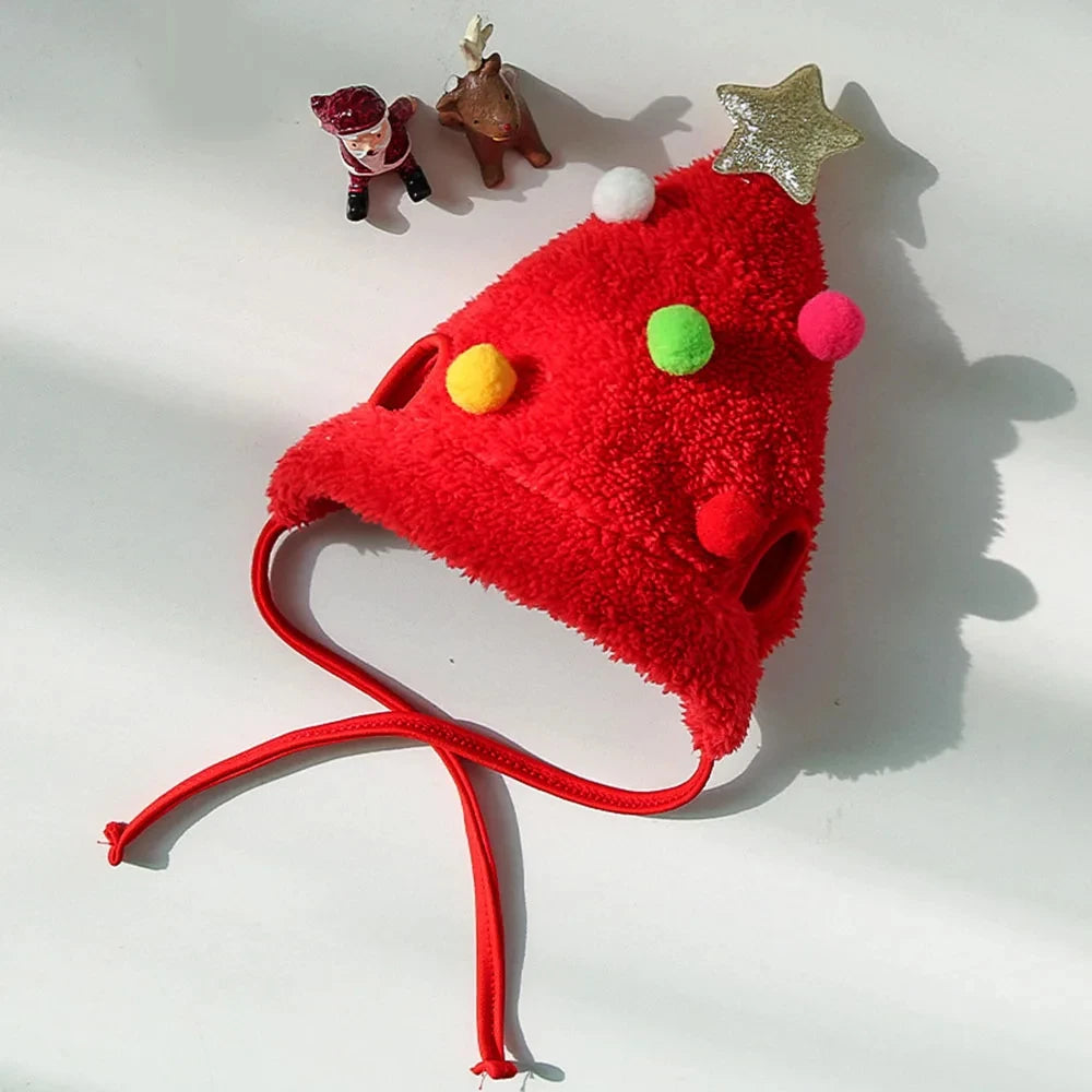 Pet wearing a Santa elk hat and Christmas bandana bib scarf for holiday celebration