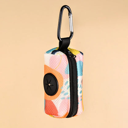 Colorful dog poop bag dispenser with leash clip and stylish print design