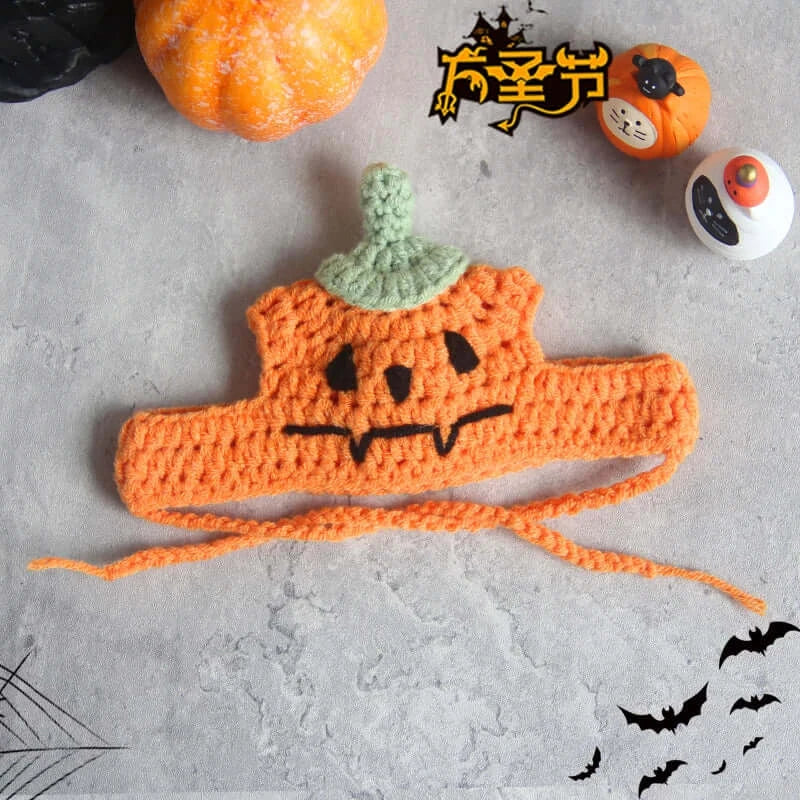 Hand-knit Halloween pet collar bib featuring ghost designs, perfect for dressing up cats and dogs during the spooky season.