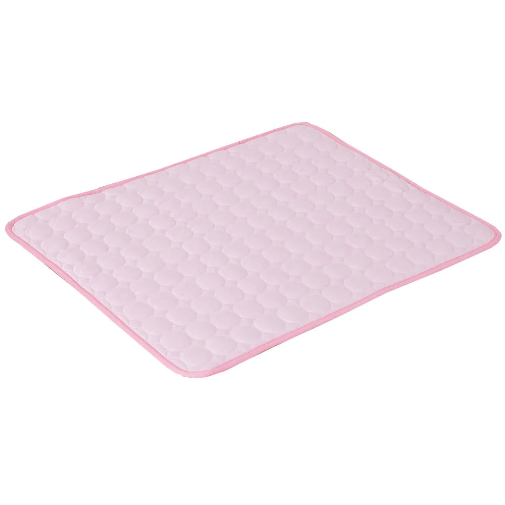 Pet cooling mat in ice silk fabric for summer comfort, suitable for dogs and cats in various sizes.