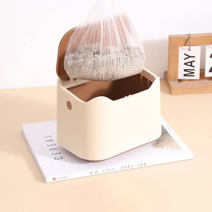 Compact enclosed cat waste box with sealed lid, odor-control design, and easy-carry handle for litter storage.