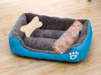 Bone-shaped soft cotton dog bed, washable and breathable with warm padding, designed for year-round comfort and suitable for dogs of all sizes.