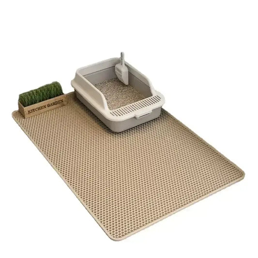 Double-layer non-slip cat litter mat with waterproof bottom layer, hexagonal litter-trapping design, and soft EVA material for comfortable, easy cleanup.