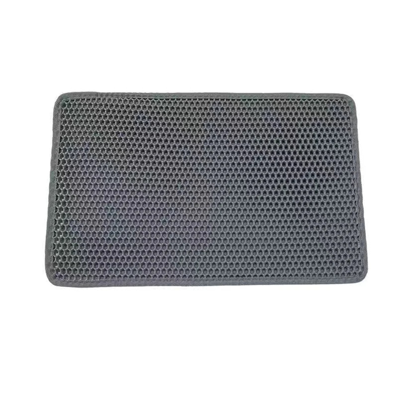 Double layer EVA cat litter mat with waterproof bottom, non-slip surface, and hexagonal holes for litter capture, ideal for maintaining a clean pet area.