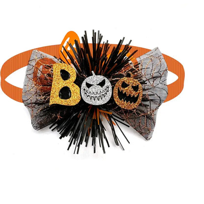 Dog wearing a cute pumpkin and skull Halloween bow tie for festive fun.