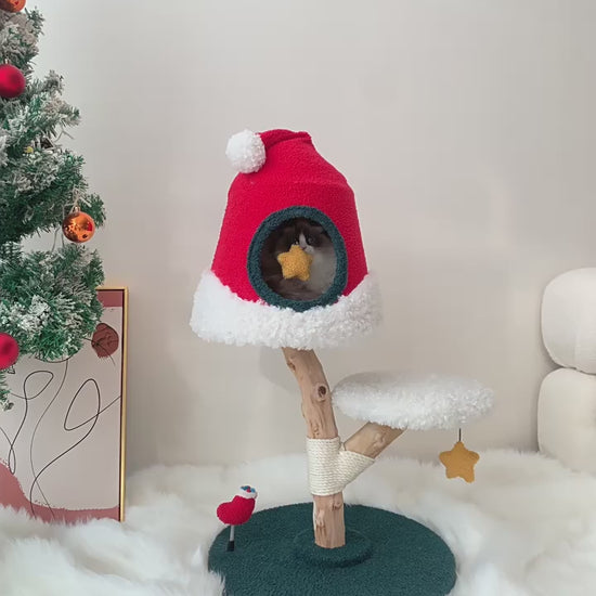 Festive Christmas tree cat tree with sisal rope posts, platforms, and a cozy cat house for climbing and scratching.