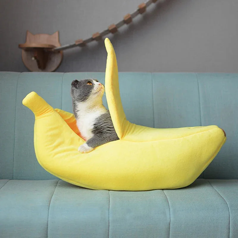 Large banana-shaped cat bed for warmth and comfort, ideal for cats and small dogs.